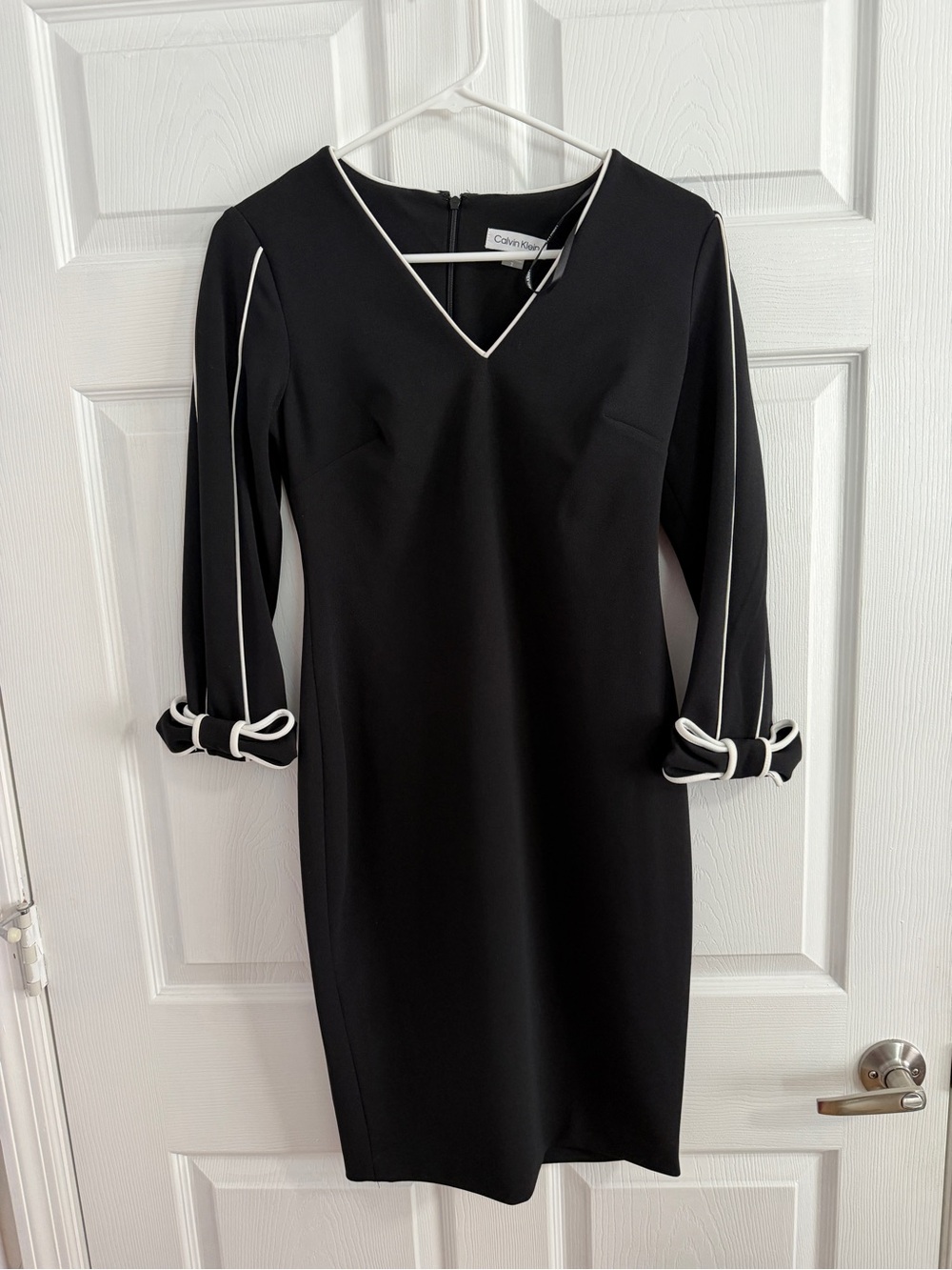 Calvin Klein Black Sheath Dress with White Piping and Bow Cuffs